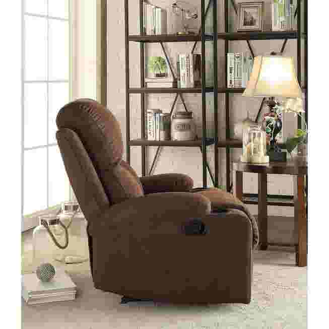 Brown recliner in living room with bookshelf