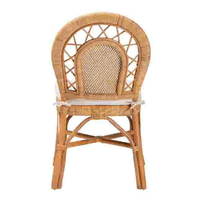 Front view of natural rattan dining chair with curved backrest and cushioned seat