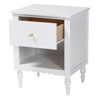 White nightstand with open drawer and visible interior