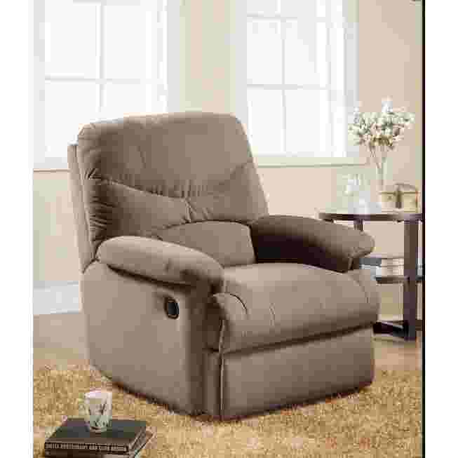 Beige recliner in living room with side table