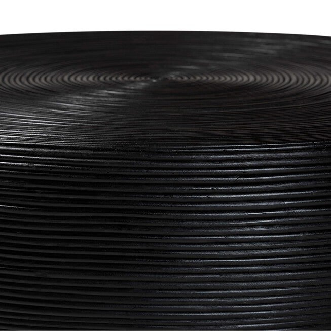 Close-up of black concentric rattan strip pattern on coffee table