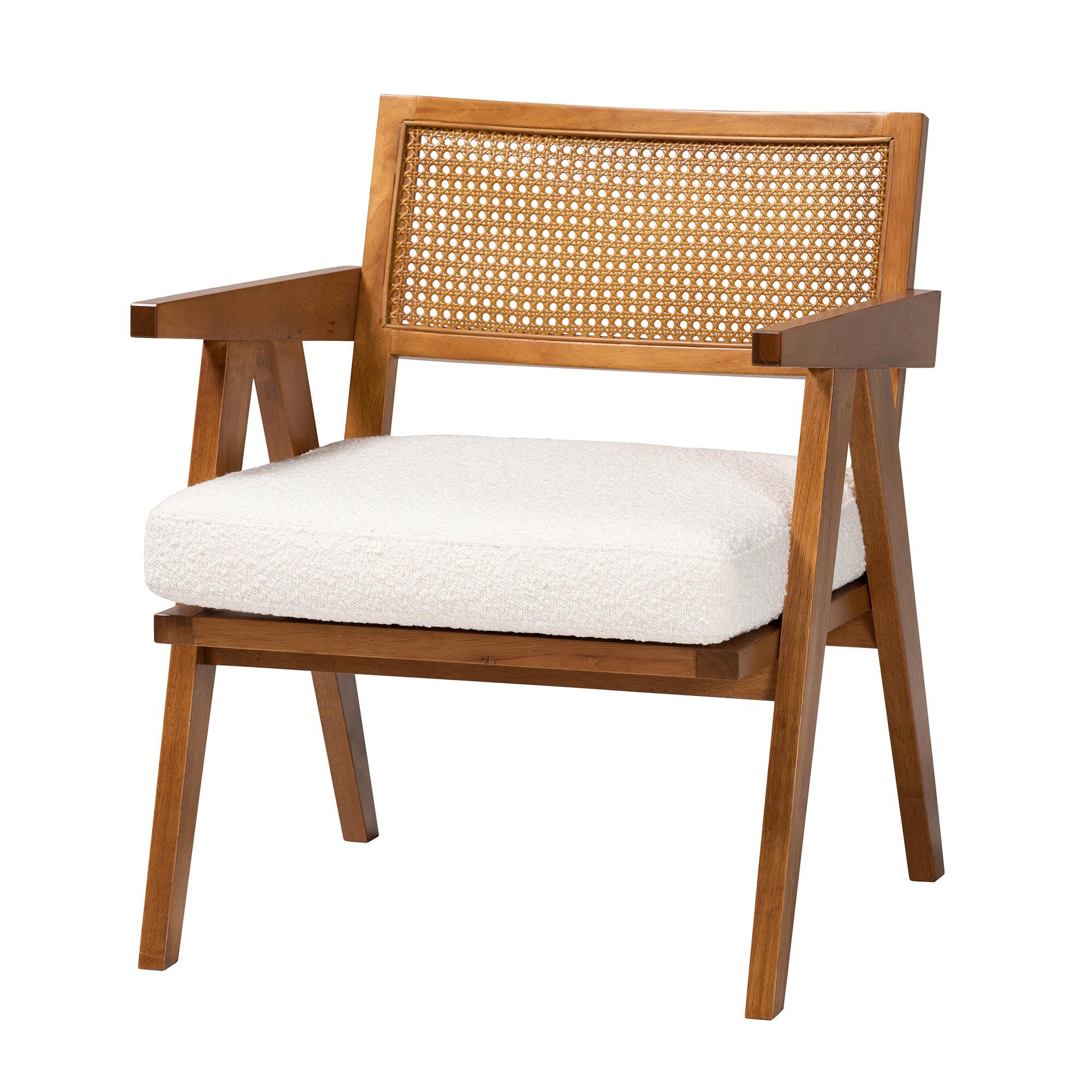 3/4 view of wooden armchair with woven back and white cushion