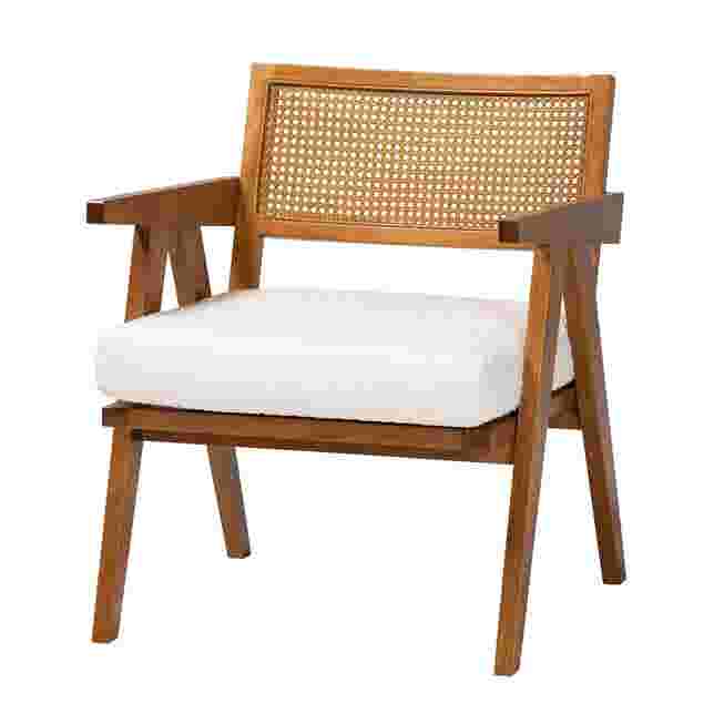 3/4 view of wooden armchair with woven back and white cushion