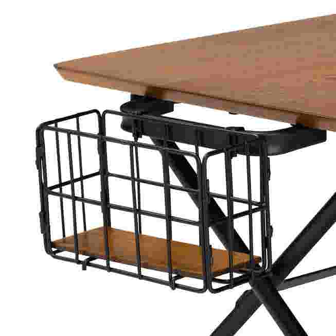 Close-up of metal basket attached to table
