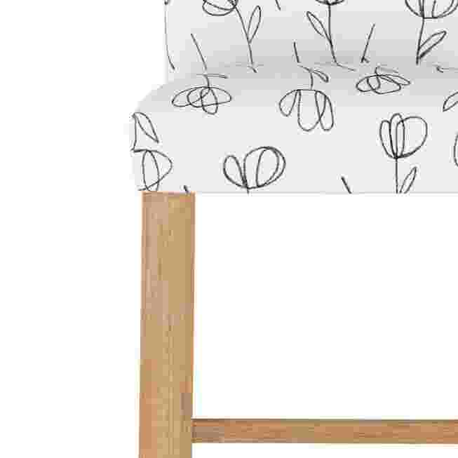 Tulip patterned fabric on barstool