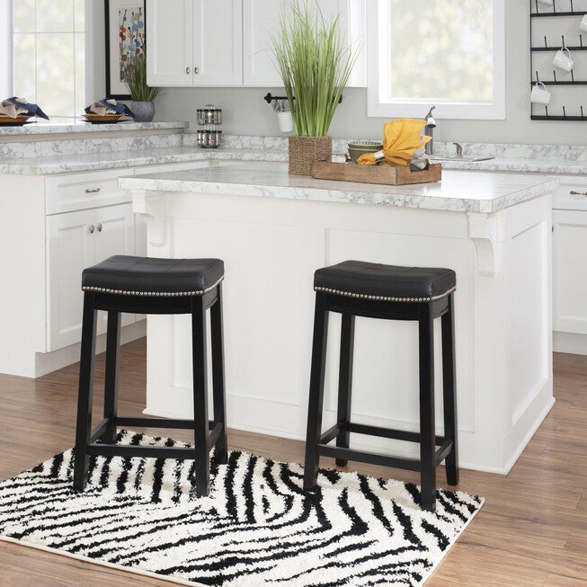 Set of Claridge faux leather bar stools with nailhead-trimmed upholstered seats