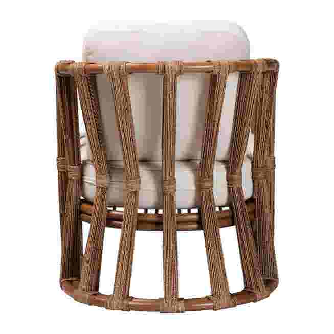 Back view of rattan armchair with white cushion