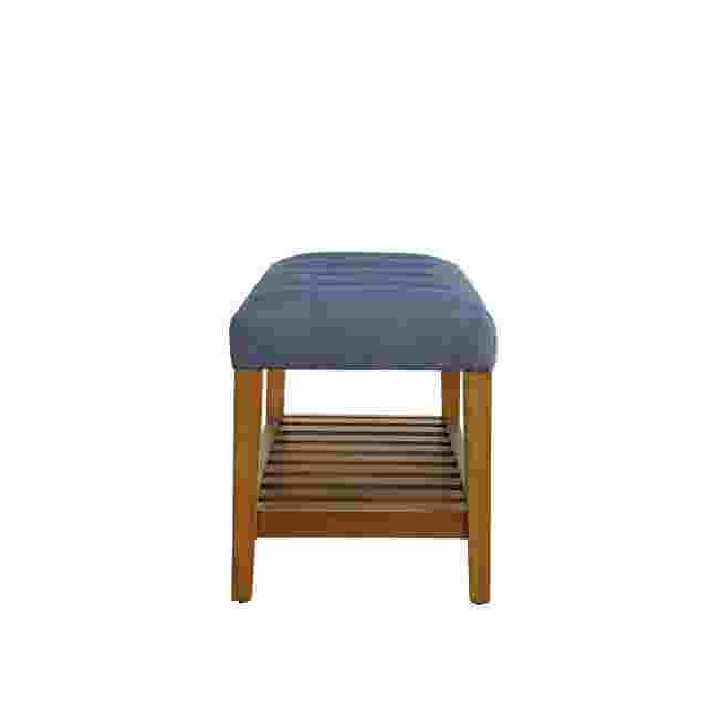 Gray tufted bench with wooden legs and shelf