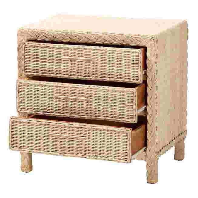 Sun bleached rattan nightstand with two drawers open