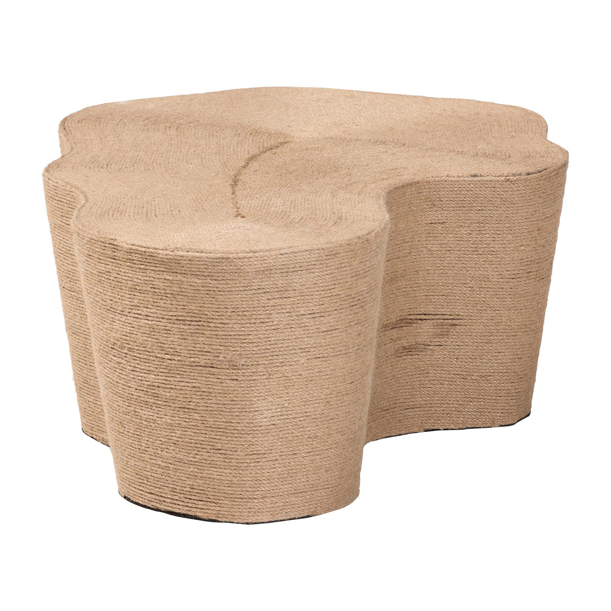 Natural jute coffee table with wavy design from a three-quarter view
