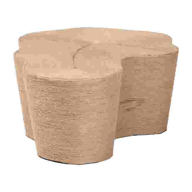 Natural jute coffee table with wavy design from a three-quarter view