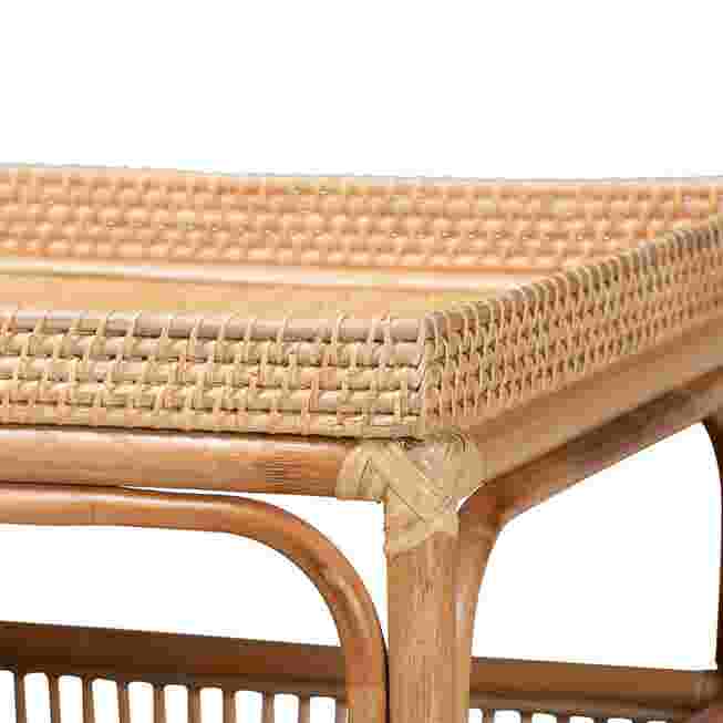 Close-up of the woven rattan top of a coffee table.