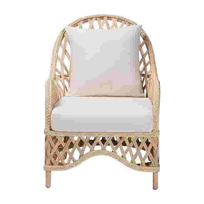 Front view of ivory braided rattan arm chair with cushions