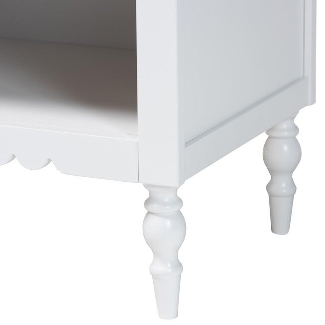 Close-up of white nightstand legs and open compartment base