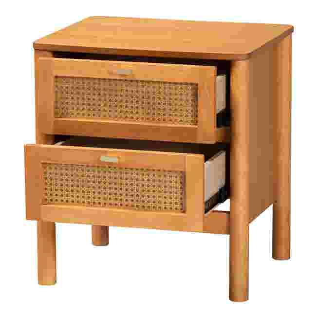 Side view of golden brown 2-drawer wood nightstand with rattan fronts