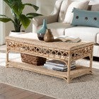 Natural rattan coffee table with ring trim in living room setting
