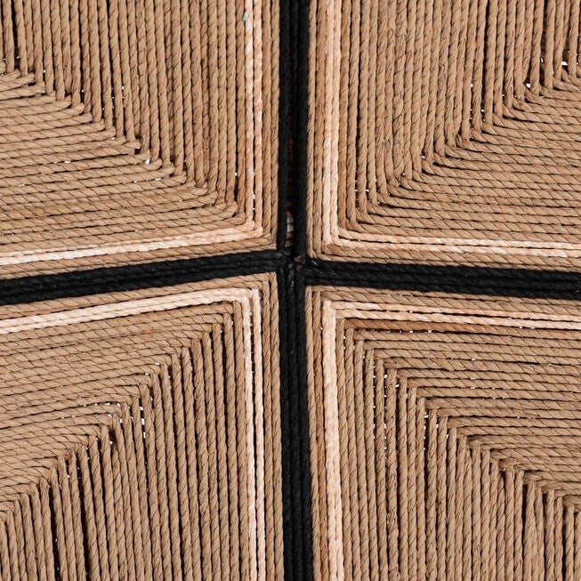 Close-up of woven paper-loom pattern with dark stitch lines