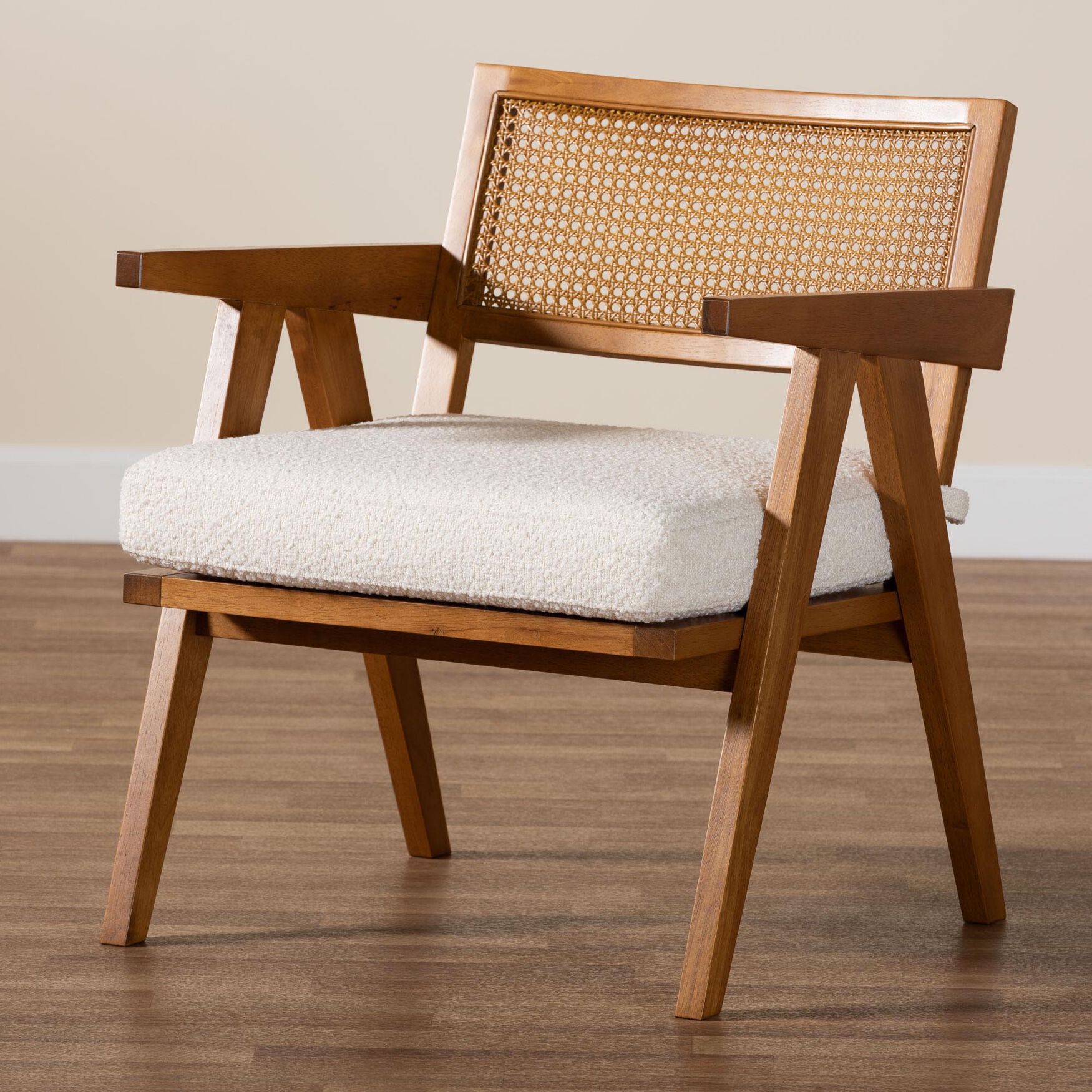 Armchair with wooden frame and woven back