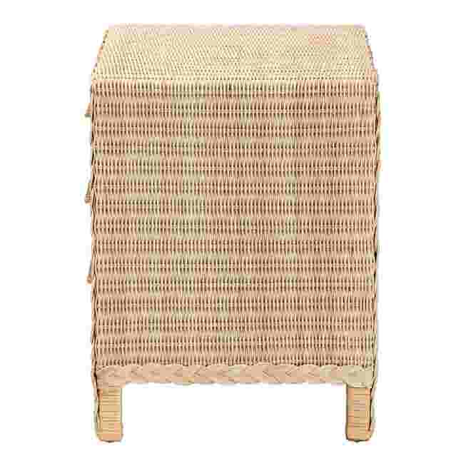 Side view of a sun bleached rattan nightstand