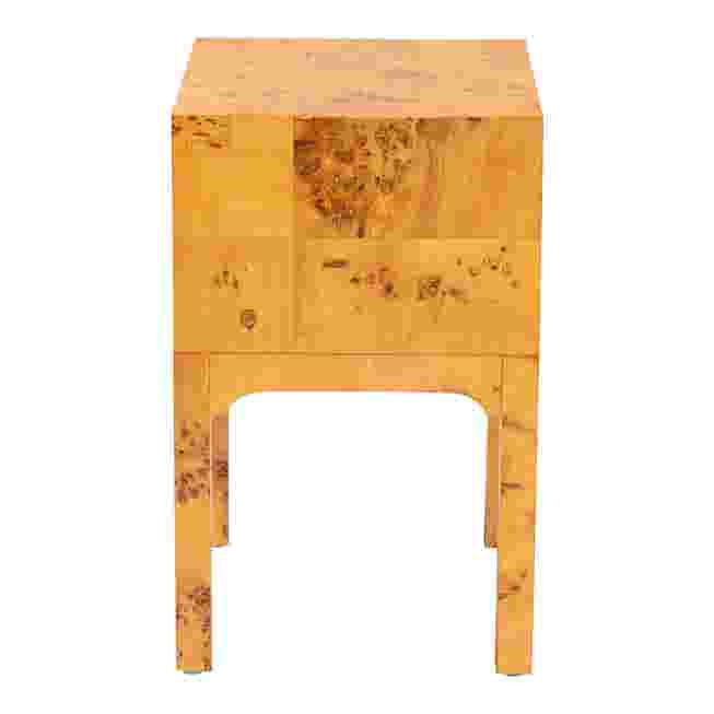 Close-up of the nightstand's side, highlighting the wood grain and texture.