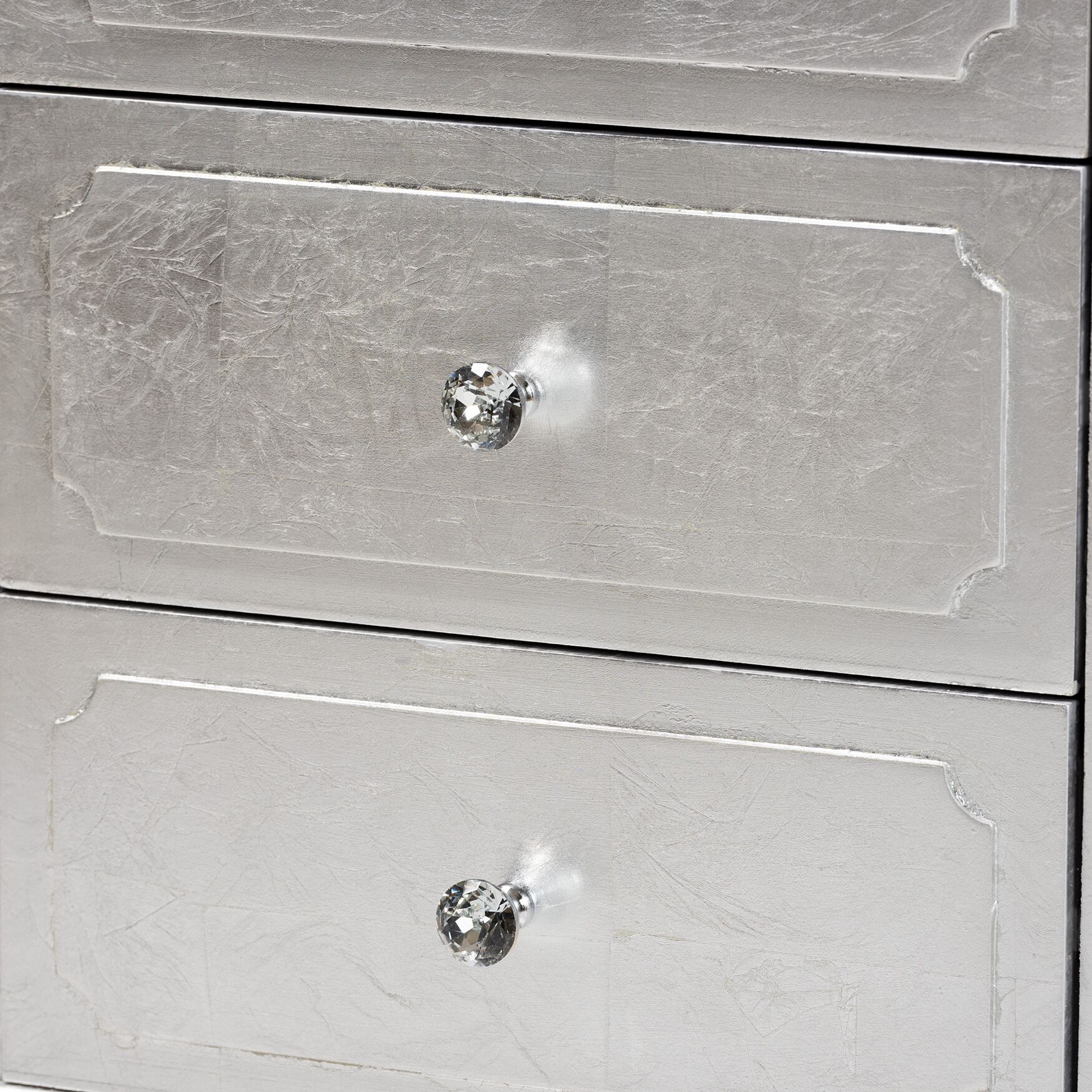 Close-up of drawer front knob and trim