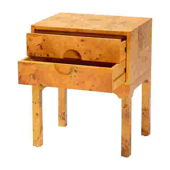 Close-up of the nightstand showing the drawer partially open.
