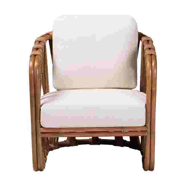 Rattan armchair with white cushion on white background