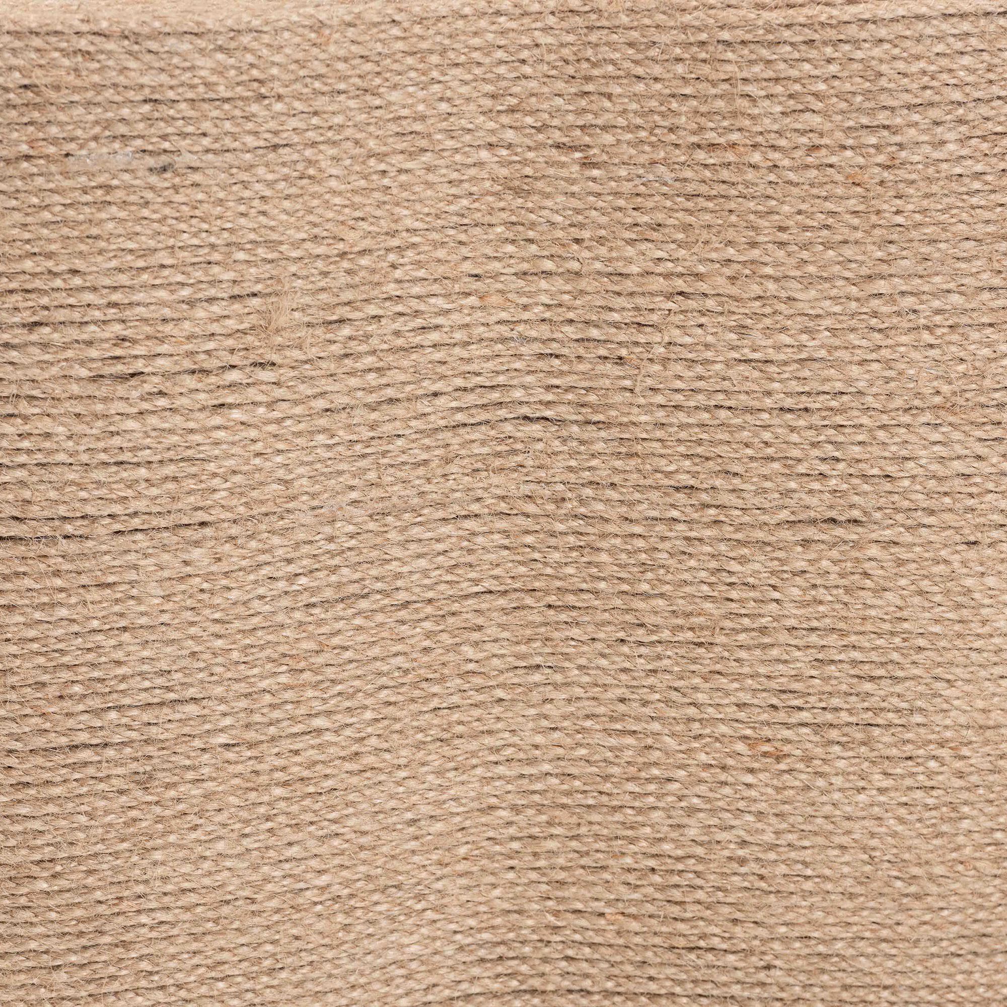 Close-up of the woven texture of the natural jute coffee table