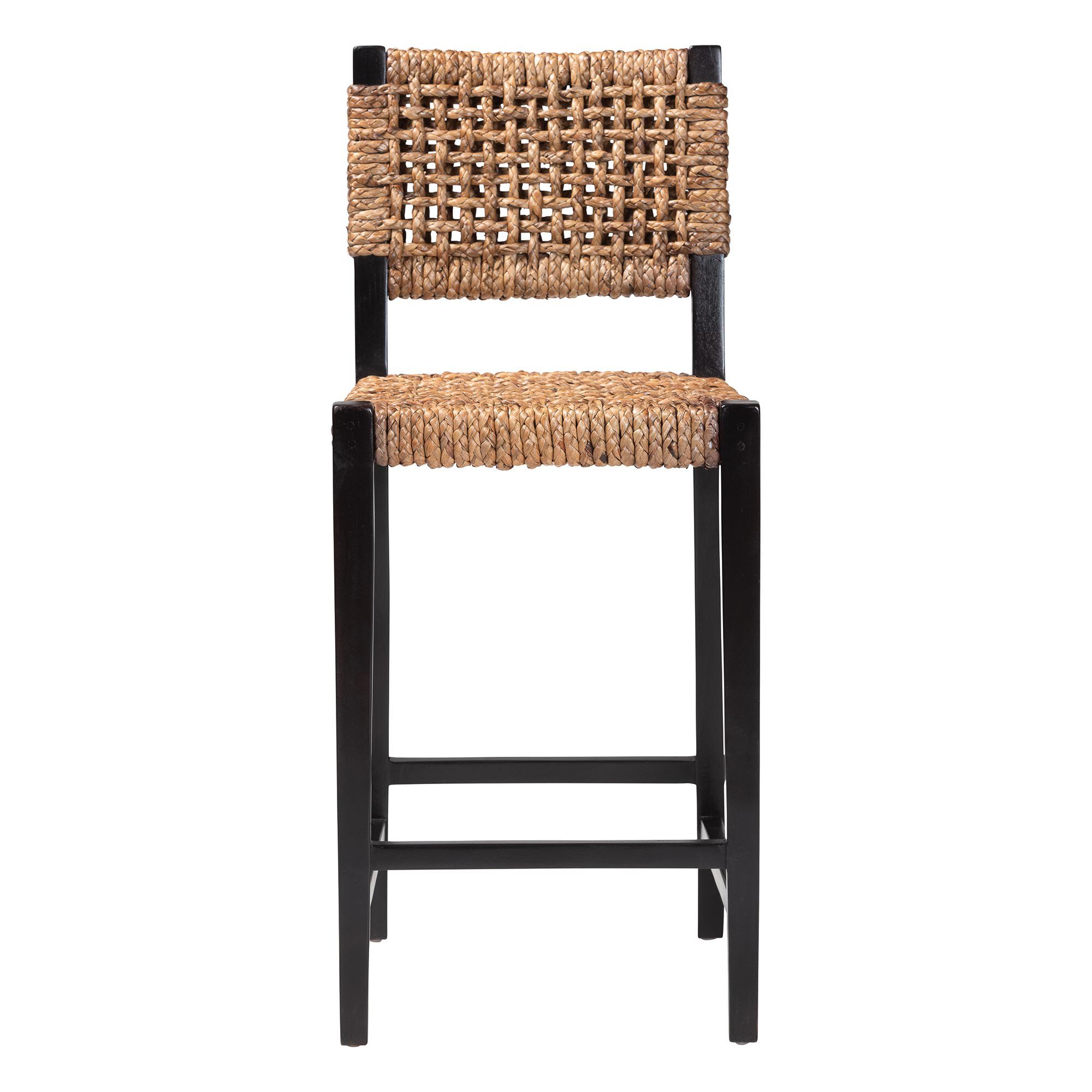 A seagrass bar stool with a black frame.