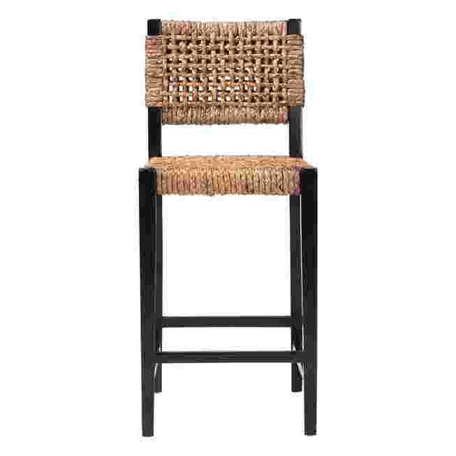 A seagrass bar stool with a black frame.