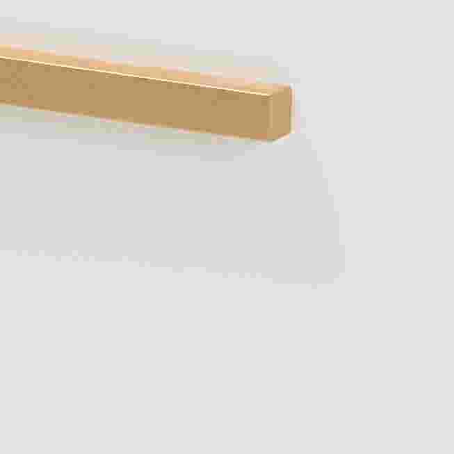 Close-up of a gold metal drawer handle