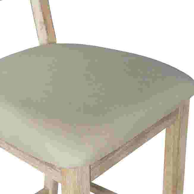 Close-up of the round tabletop/seat edge of the bar stool