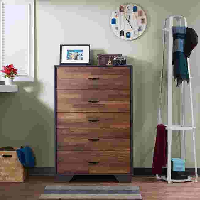 Bedroom scene with mid-century dresser against wall