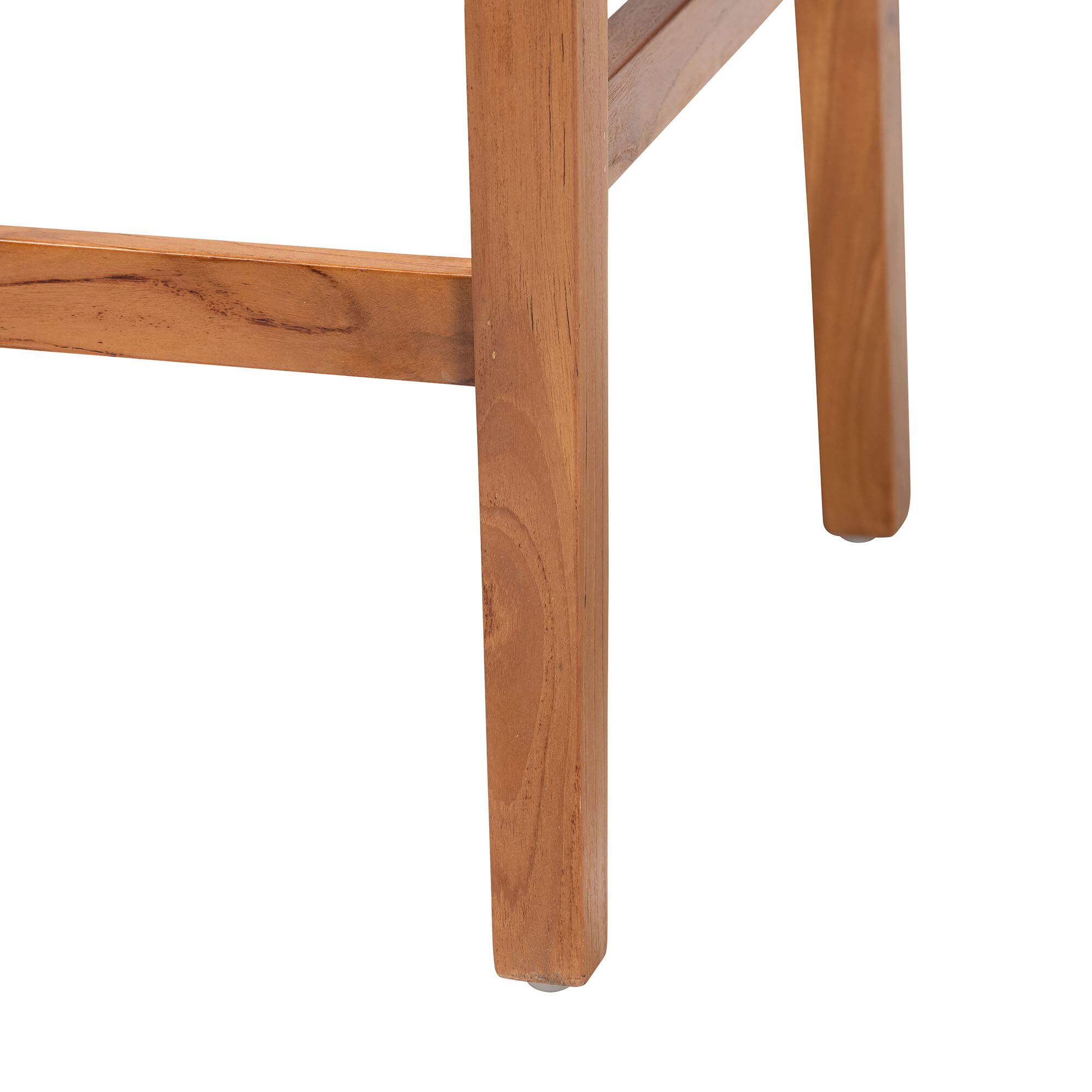 Close-up of natural mahogany wood leg and corner support on bar stool