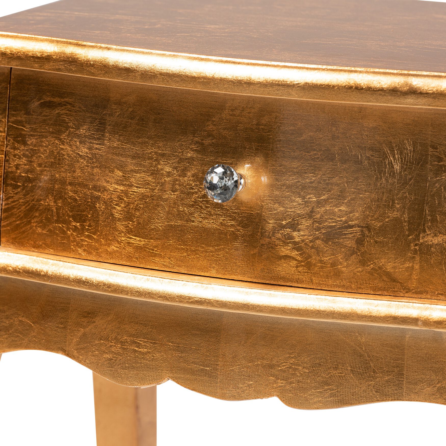 Close-up of Harriet nightstand drawer knob and carved drawer face