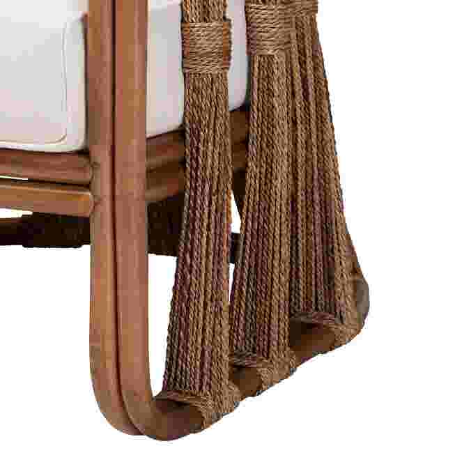 Close-up of rattan armchair leg and frame