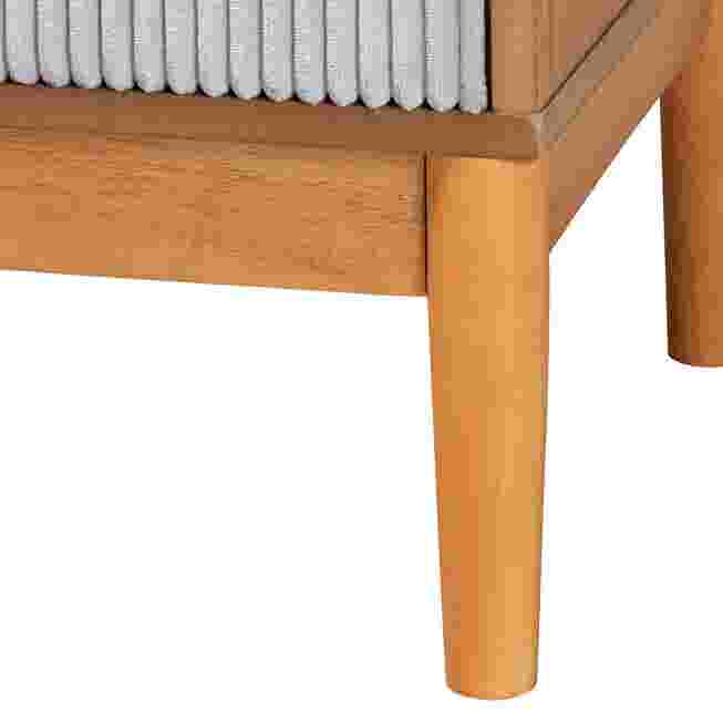 Close-up of the oak wood leg and frame of the nightstand