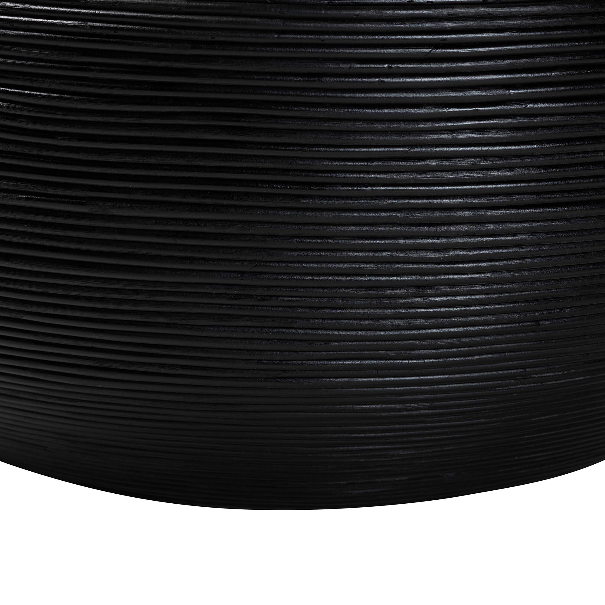 Close-up of black ribbed laminated rattan side on coffee table
