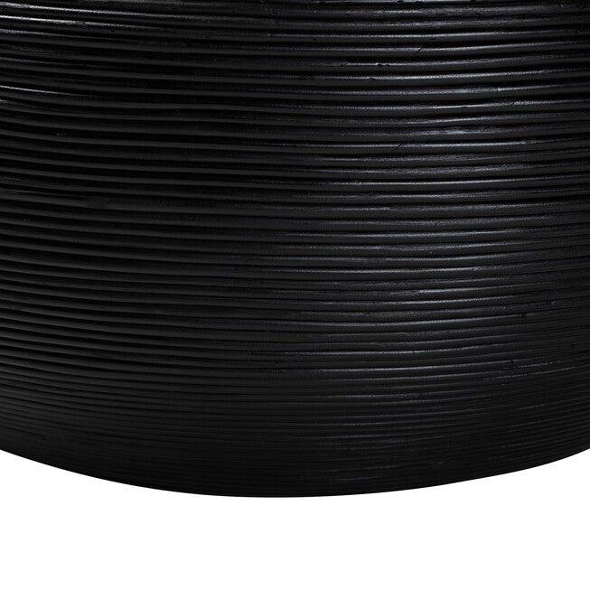 Close-up of black ribbed laminated rattan side on coffee table