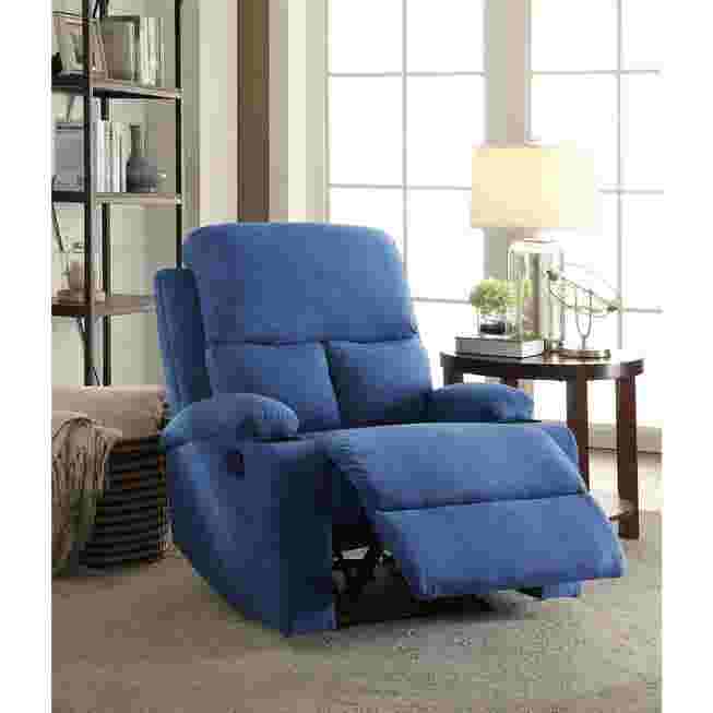 Blue recliner in living room with lamp