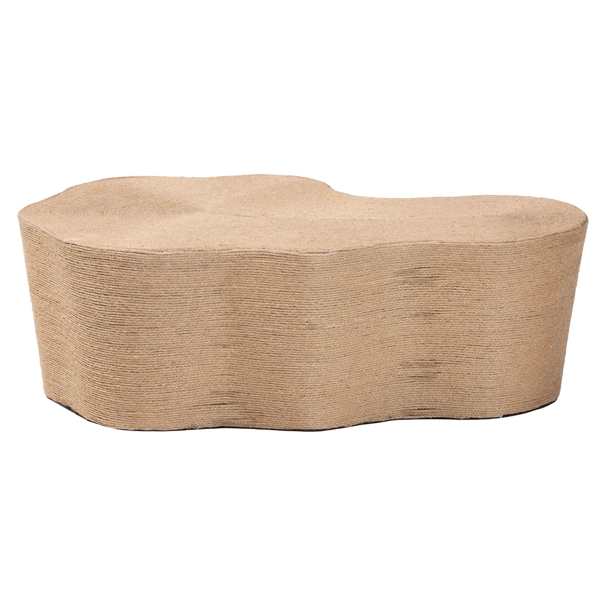 Natural jute coffee table with wavy design from a side view
