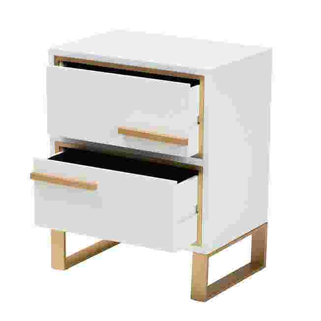 White nightstand with gold metal accents and two drawers, one drawer open