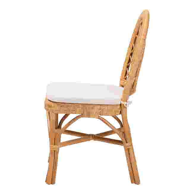 Side view of rattan dining chair with cushion