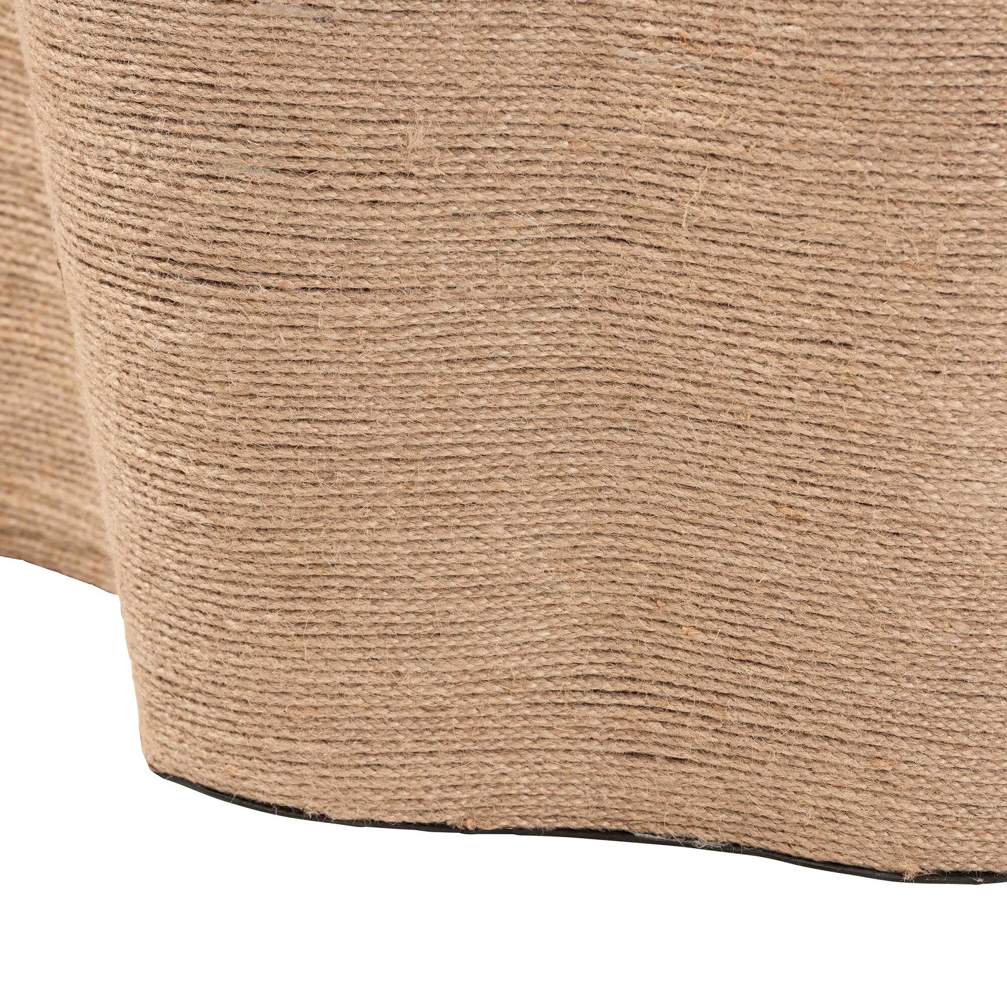 Close-up of the textured surface of the natural jute coffee table
