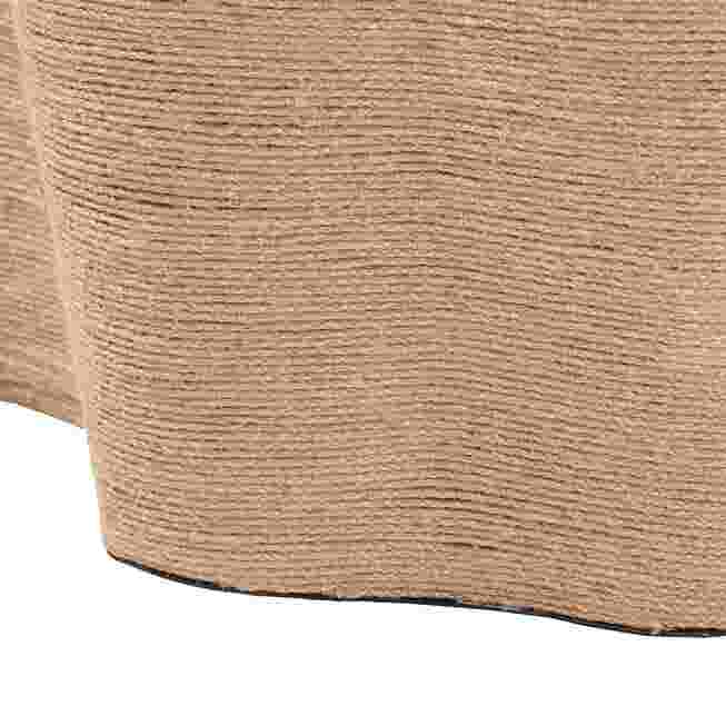 Close-up of the textured surface of the natural jute coffee table