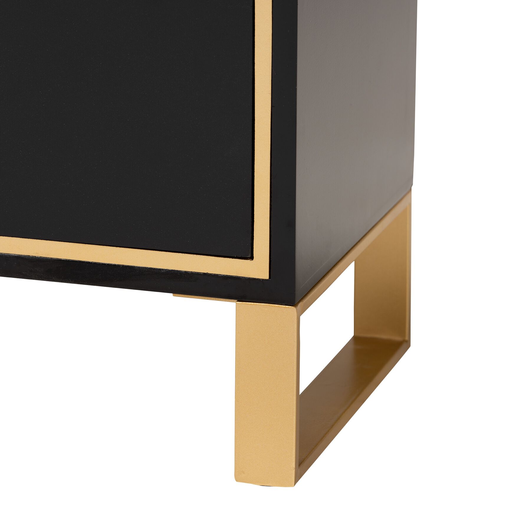 Close-up of gold leg of nightstand