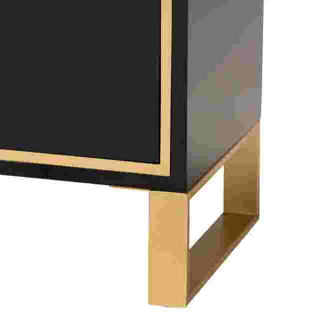 Close-up of gold leg of nightstand