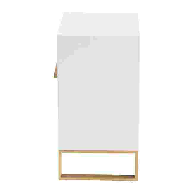 Side view of a white nightstand with gold metal accents