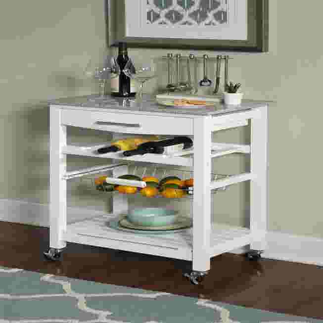 White kitchen island cart with speckled granite top and storage shelves