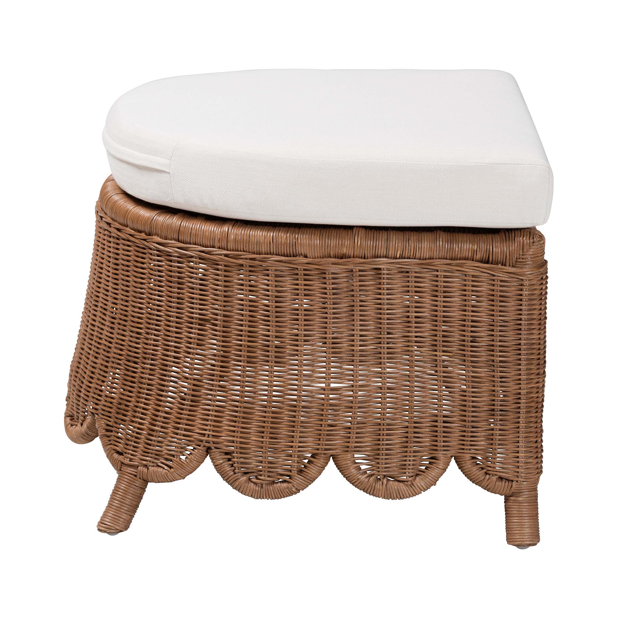 Natural rattan footstool with white cushion on a white background